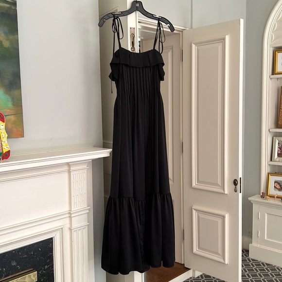 Long flowing silky thin strap black dress with faux ties at shoulders. - Picture 1 of 6